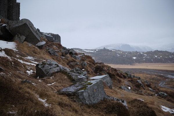 Icelandic angular rocks embedded into the hill